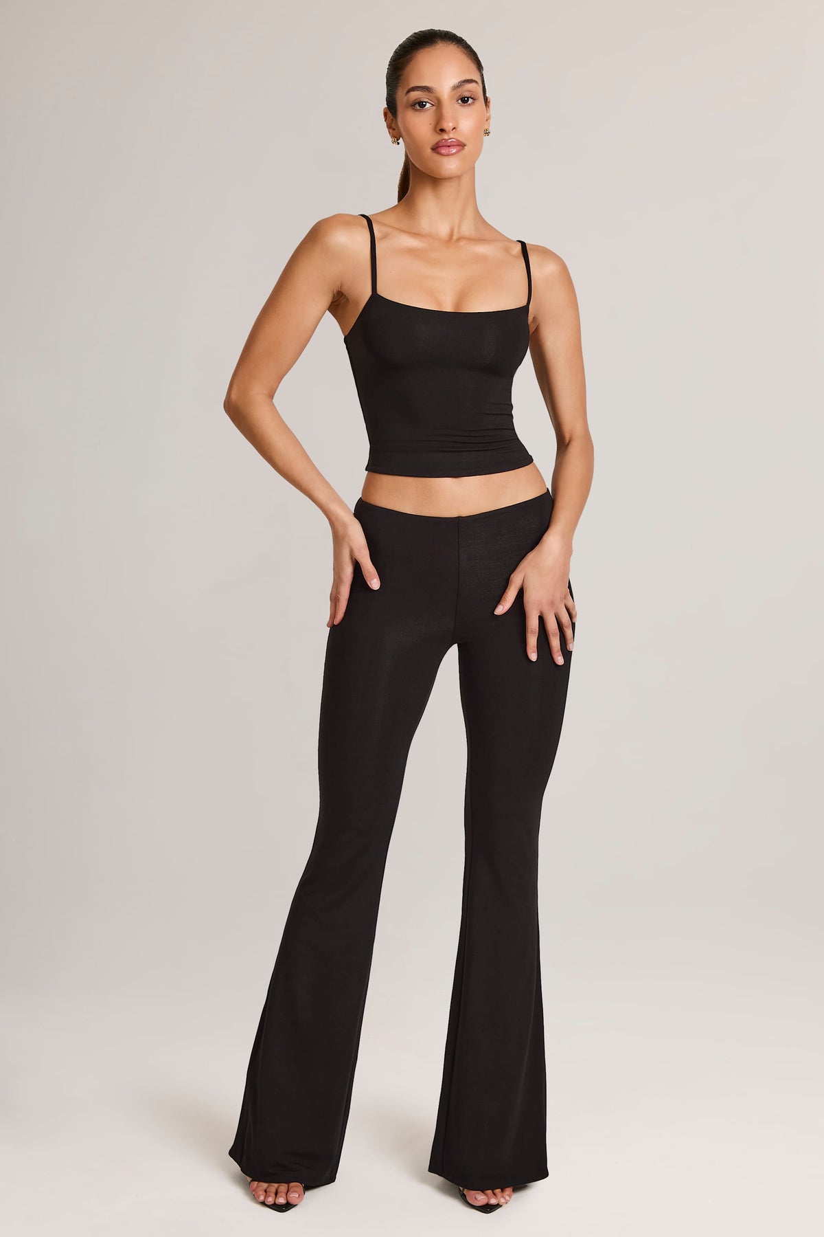 Belavie Patsi Modal Mid-Rise Flared Trousers in Black