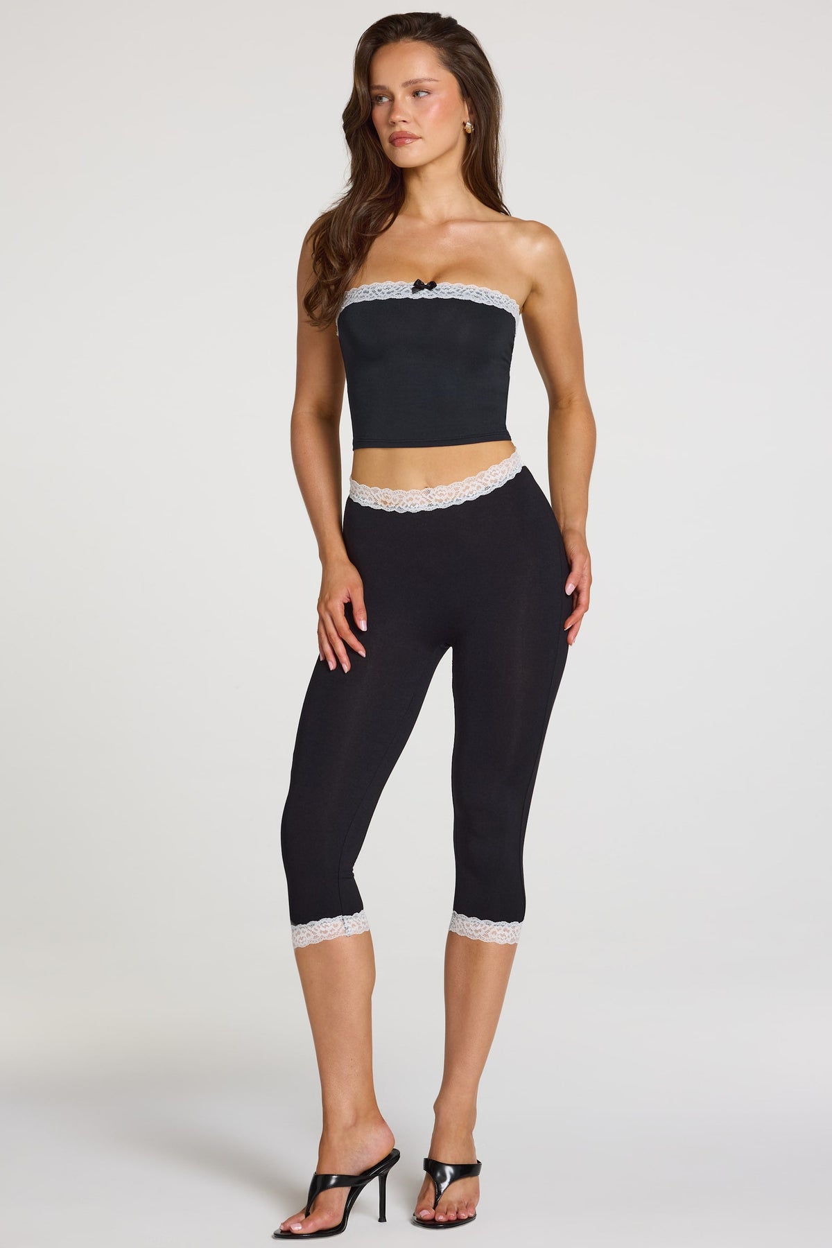 Belavie Zorine Modal Lace-Trim Mid-Rise Capri Leggings in Black