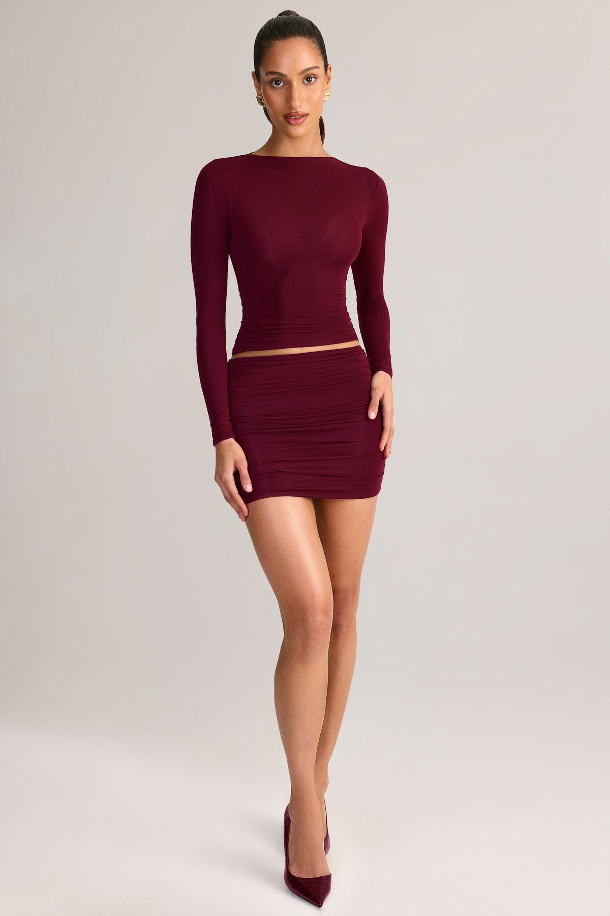 Belavie Cale Modal Ruched Mid-Rise Mini Skirt in Wine Red