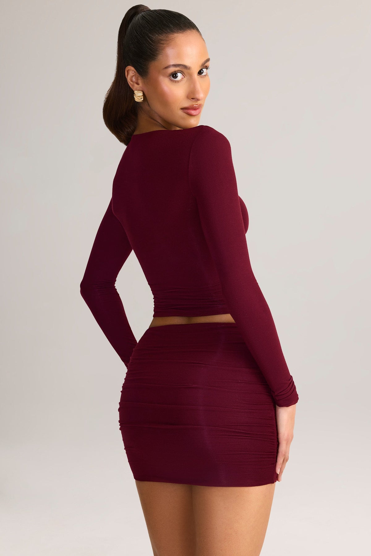 Belavie Cale Modal Ruched Mid-Rise Mini Skirt in Wine Red