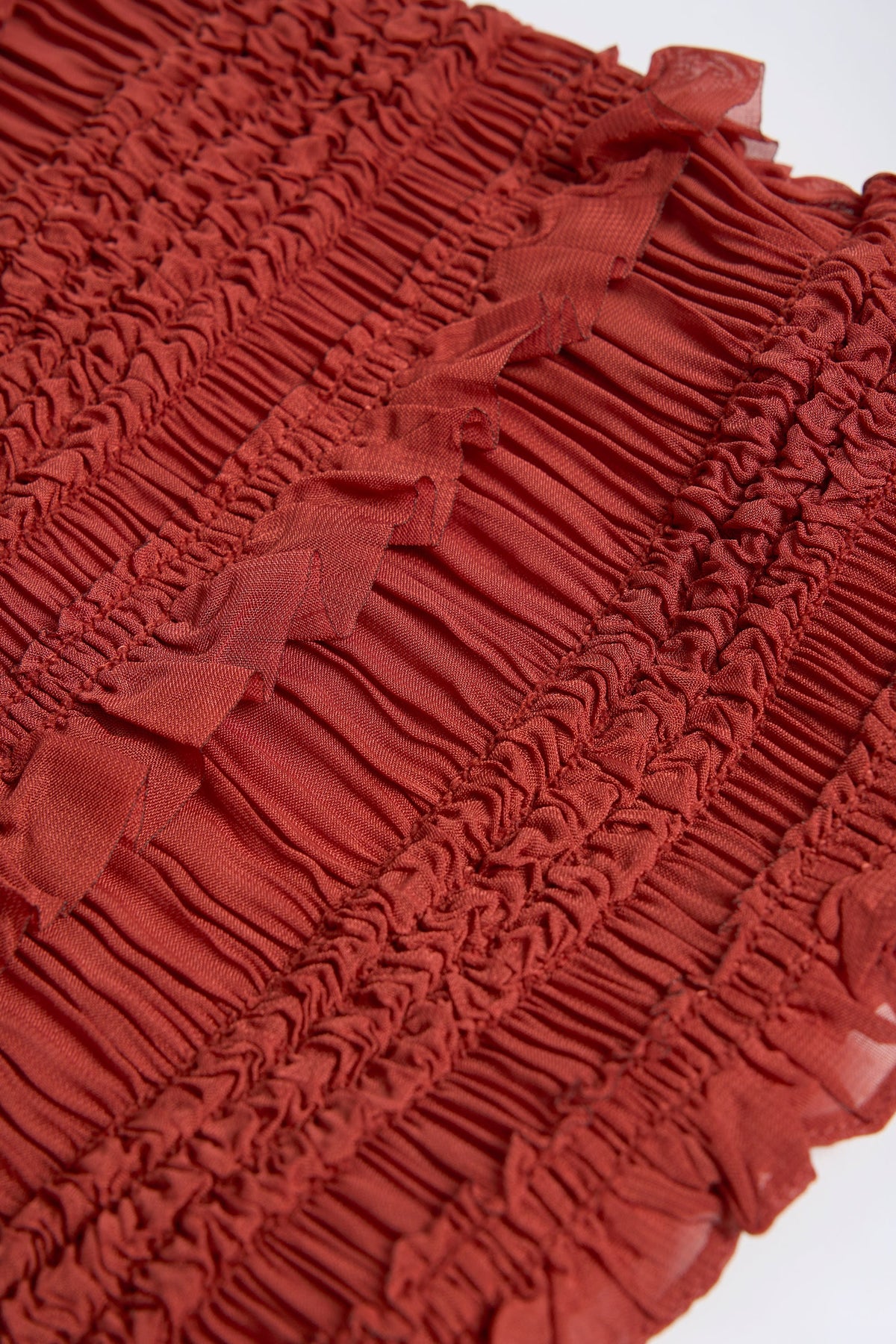 Belavie Nateshe Ruffled High-Neck Backless Top in Burnt Red