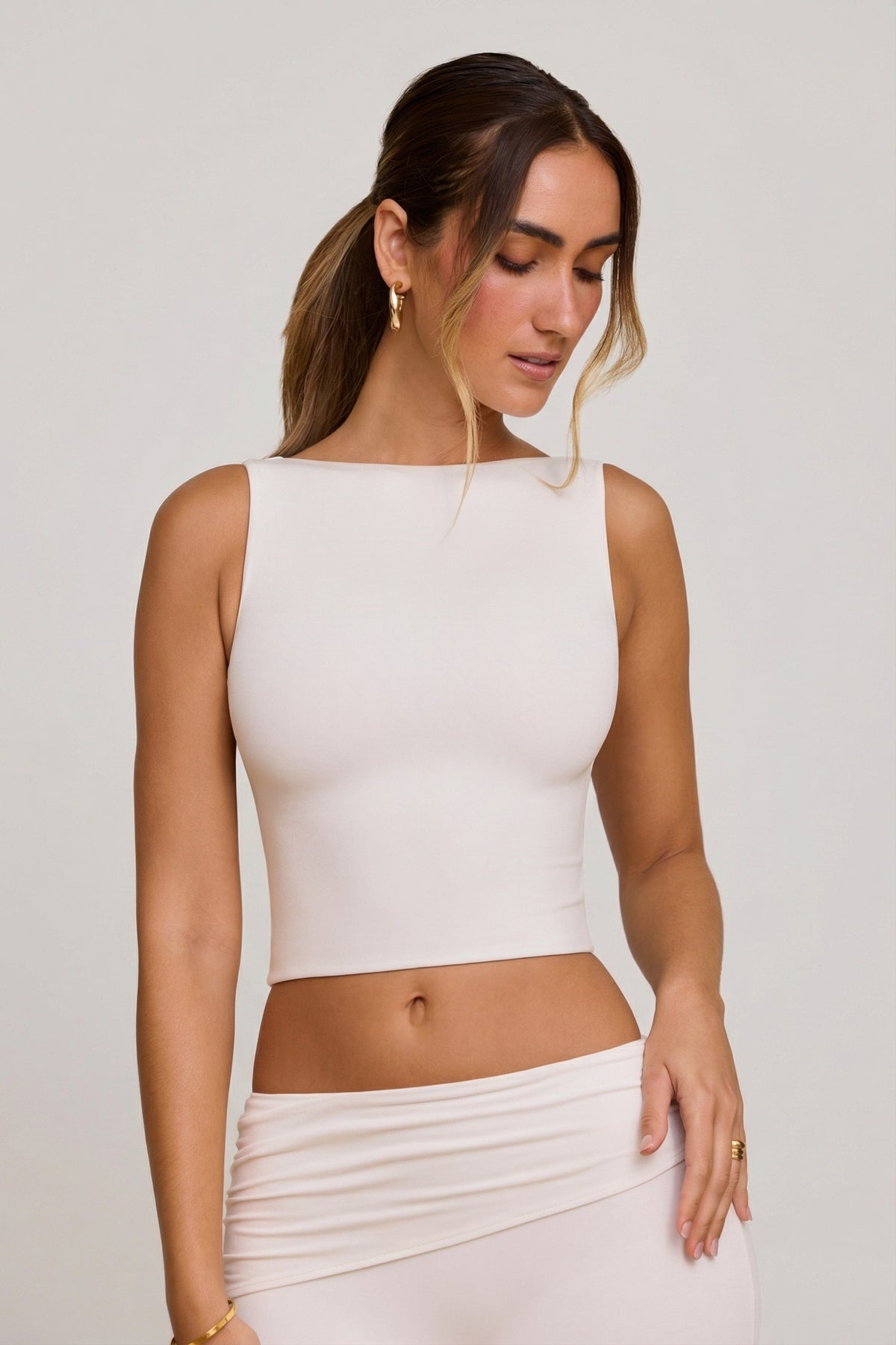 Belavie Wran High Neck Open Back Crop Top in White