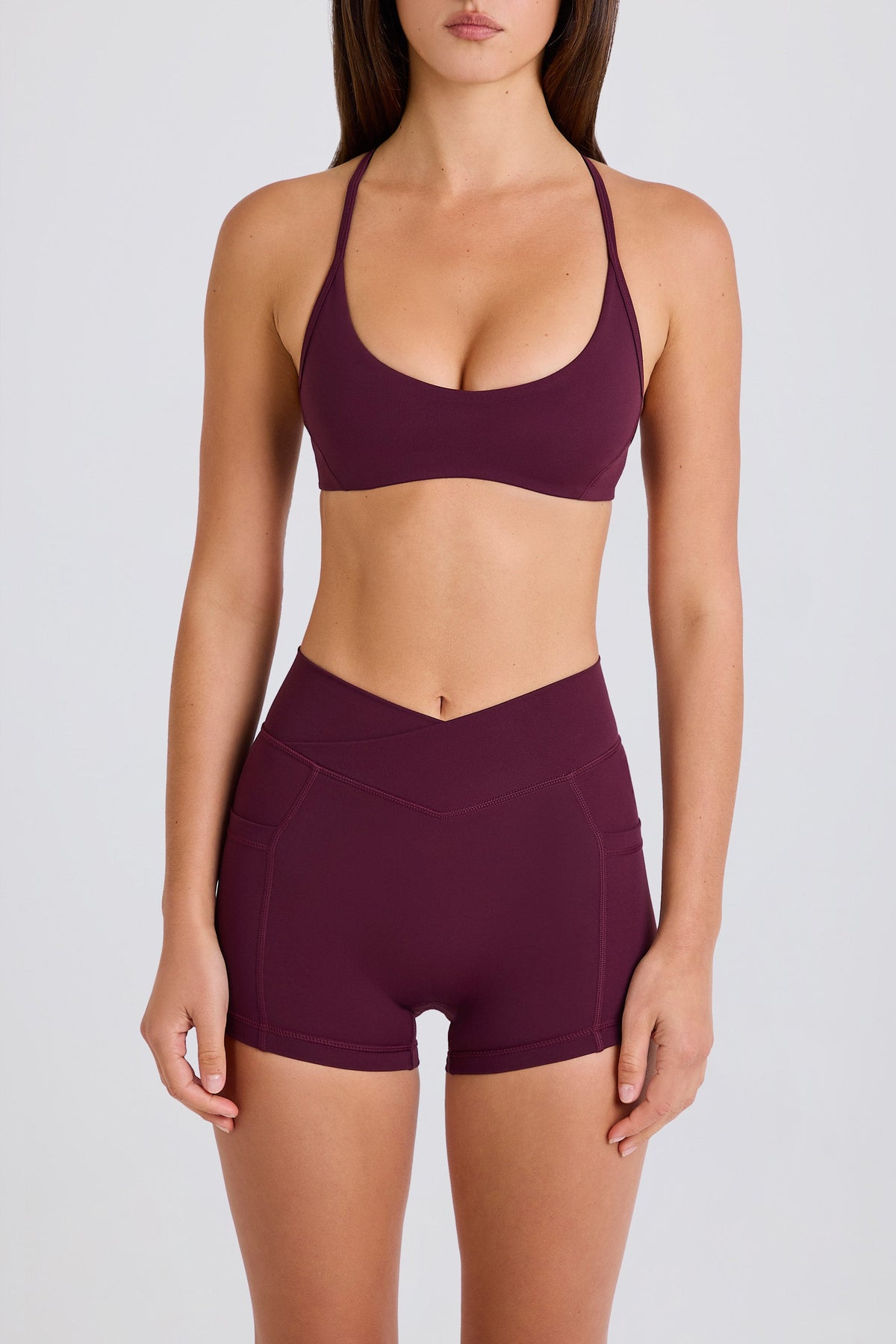 Belavie Soft Active V-Waist Pocket Mini Shorts in Burgundy