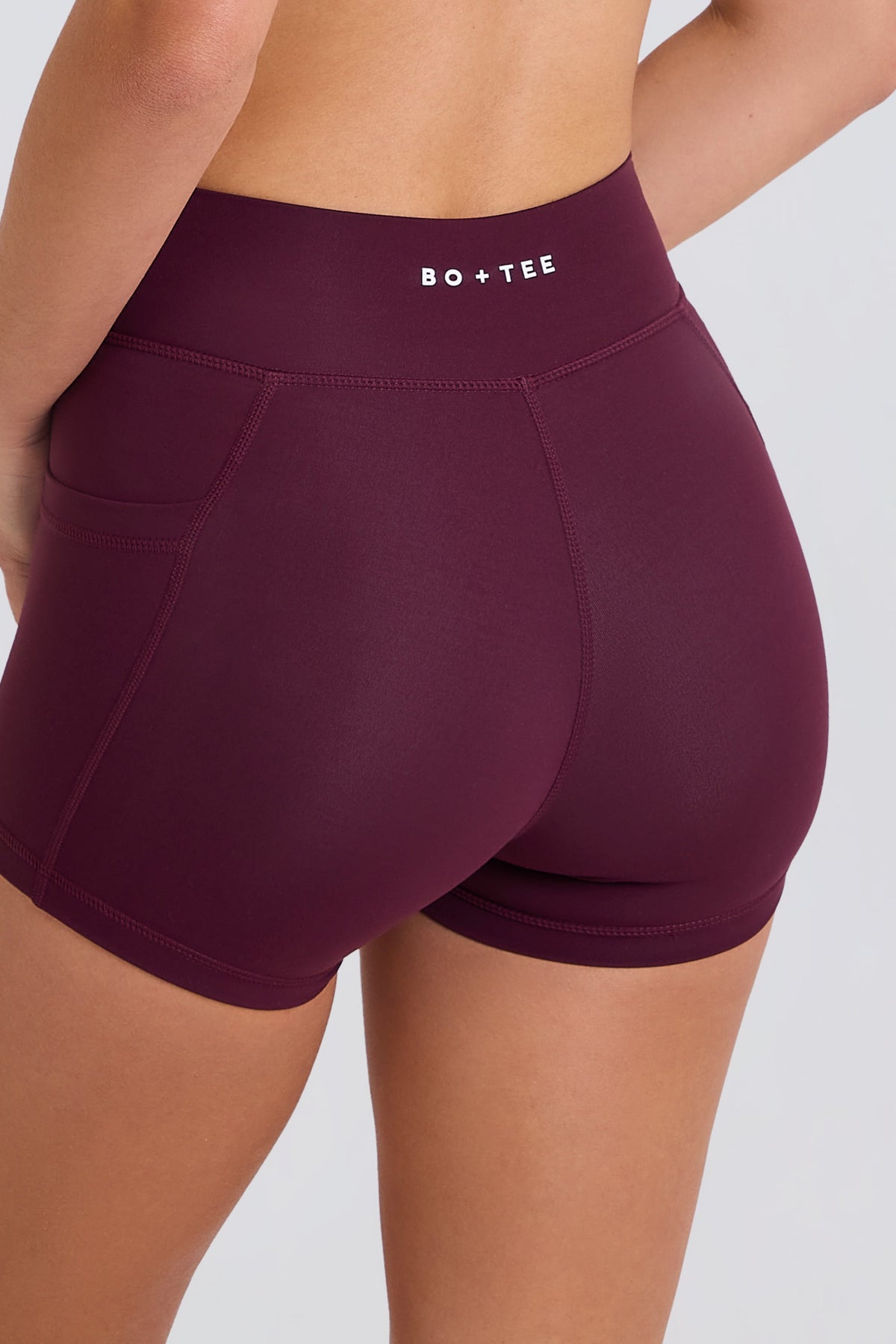 Belavie Soft Active V-Waist Pocket Mini Shorts in Burgundy